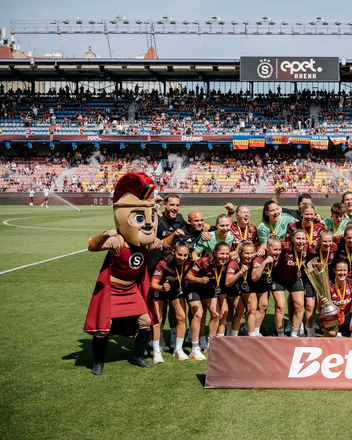 Sparta Praha players lifting the league trophy at epet Arena